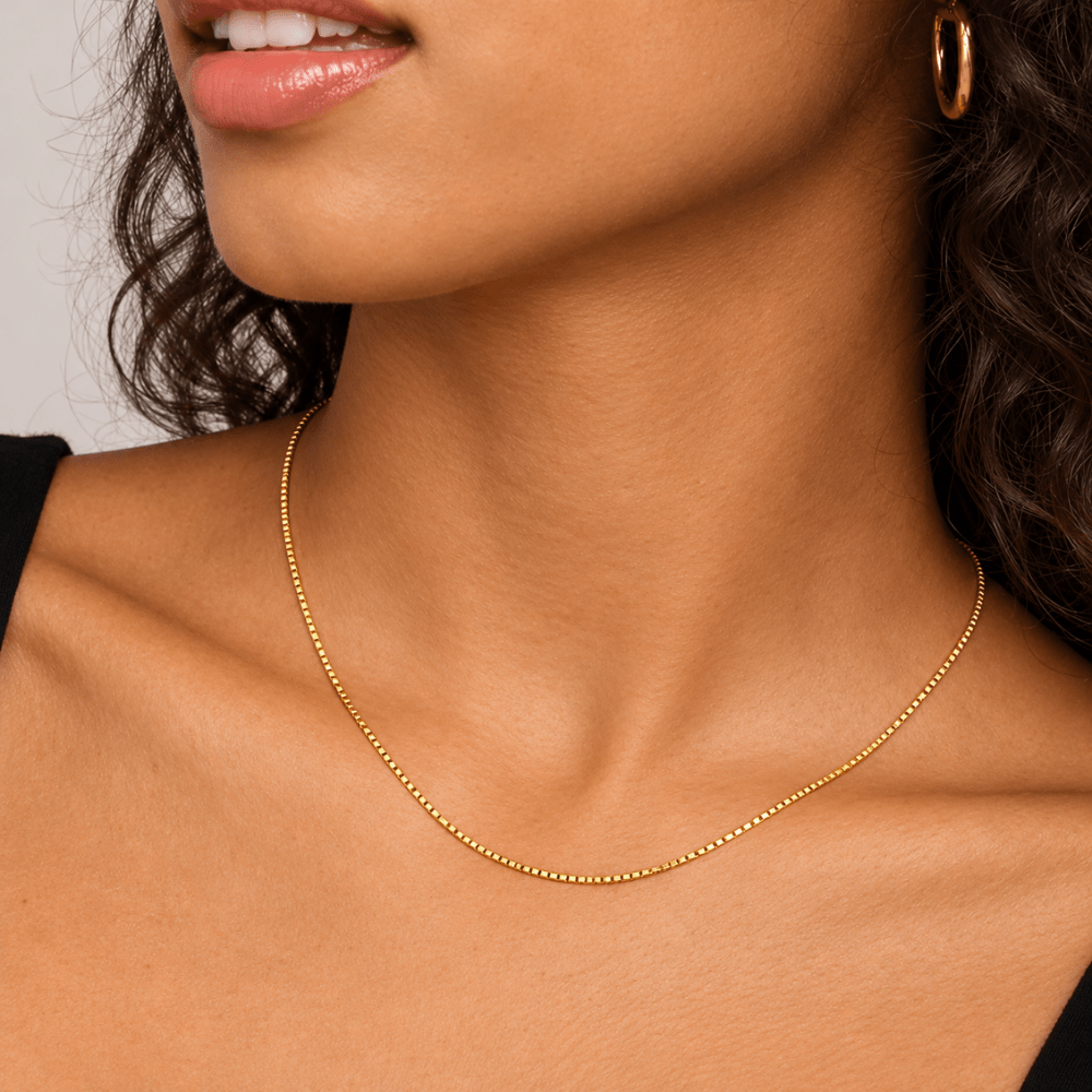 18-inch 10k yellow gold semi-solid box chain necklace worn by a female model