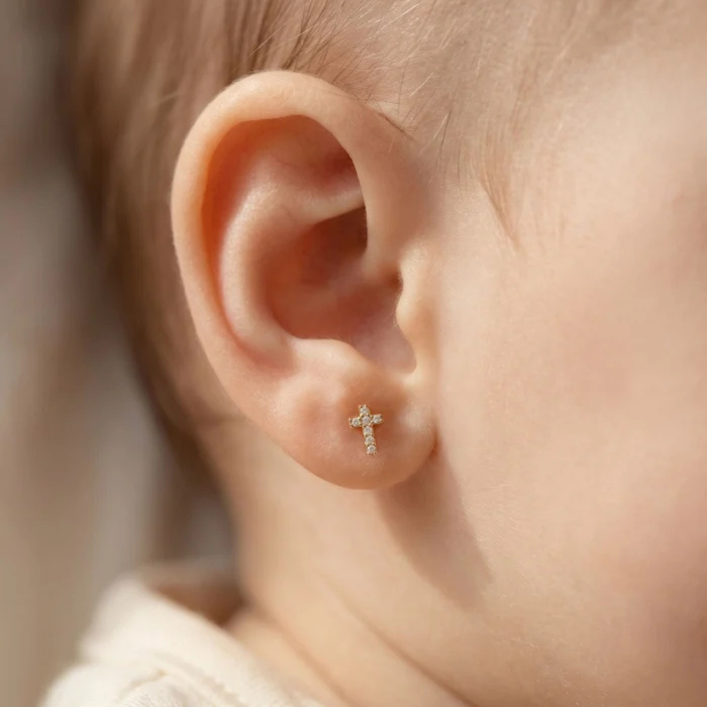 woman wearing Cross Flat Back Studs