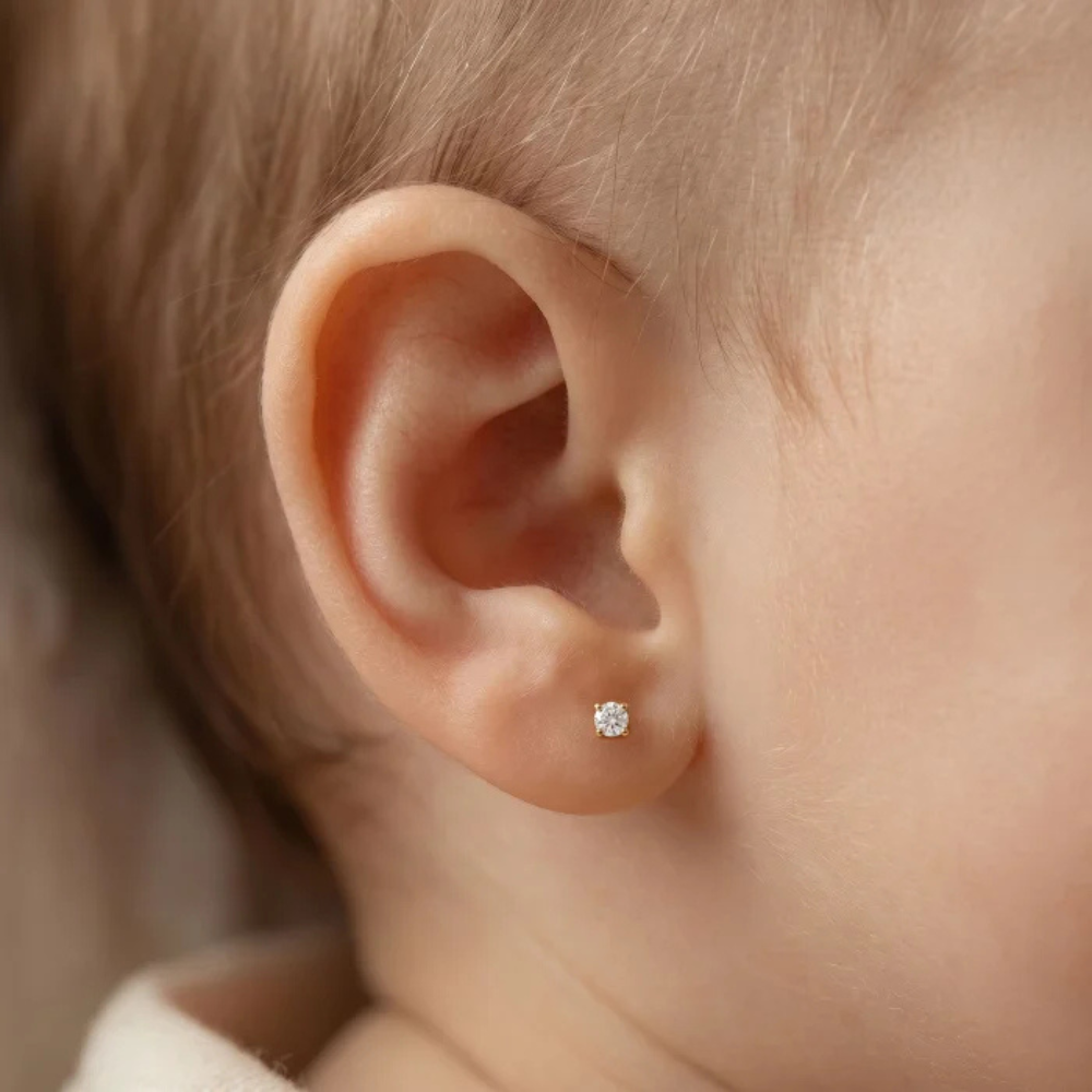 10K gold cartilage studs on ear