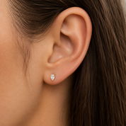 10K gold pear CZ studs on model