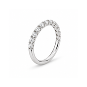 A 14K white gold diamond half-eternity band ring featuring a row of round-cut diamonds along the upper curve, set against a clean white background.