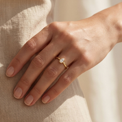 lab diamond oval bezel ring worn on hand