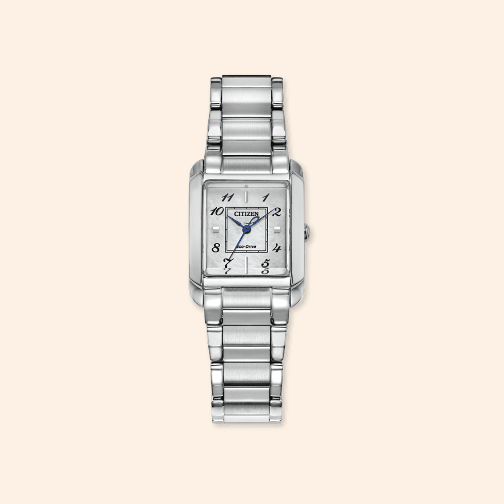 Silver Citizen watch on a beige background