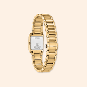 back of a citizen eco-drive yellow steel watch