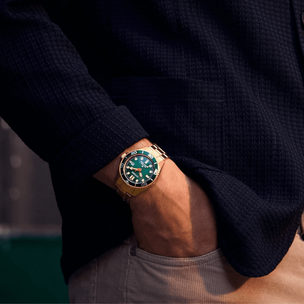 a man wearing the citizen divers watch