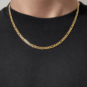 man wearing gold vermeil figaro chain everyday styling