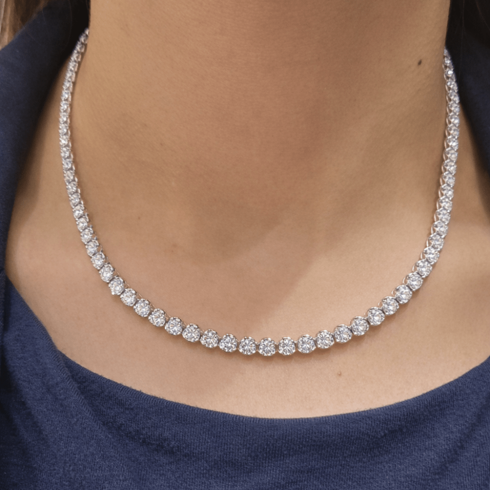Woman wearing lab diamond tennis necklace 10.9ct elegant style